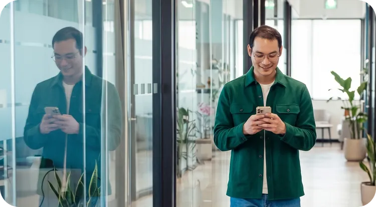 An executive in a corporate hallway managing DAC7 reporting requirements for EU digital platforms.