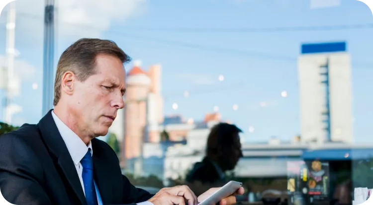 A businessman handling paperwork using an RGS electronic signature.